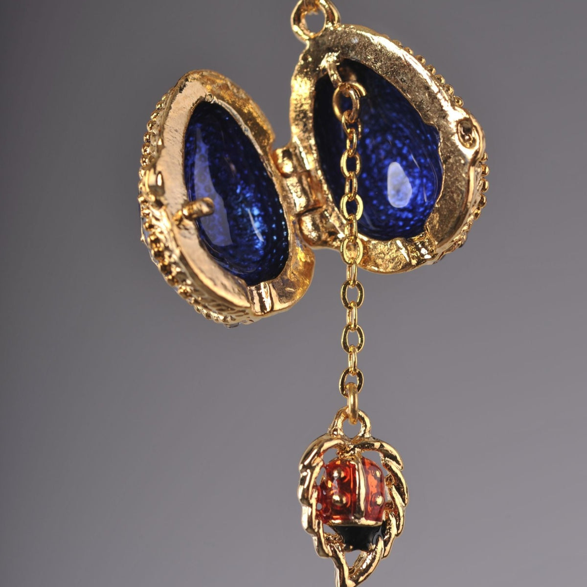 Keren Kopal Blue Egg Pendant with a Beetle