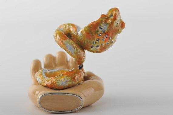 Keren Kopal Zodiac Snake Laying on Hand