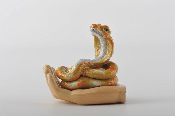 Keren Kopal Zodiac Snake Laying on Hand