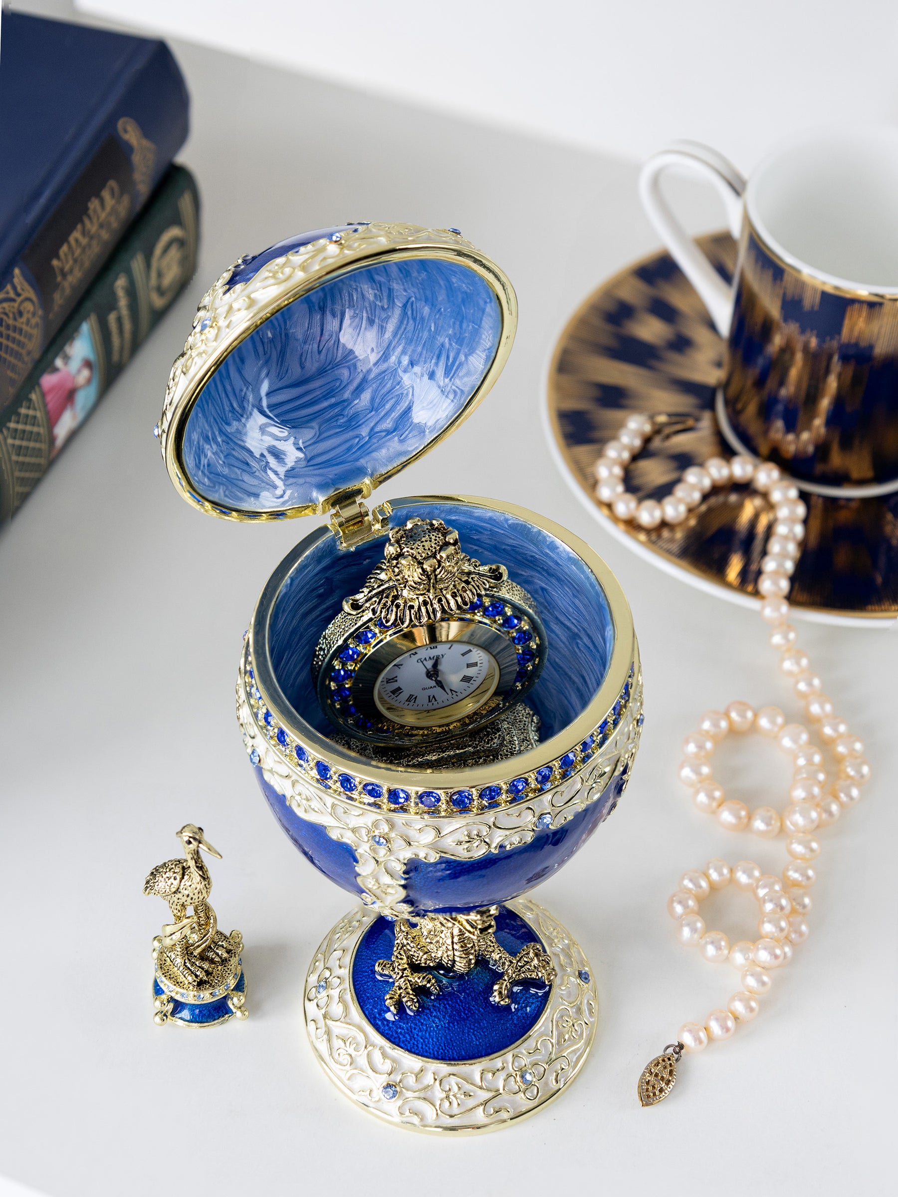 Luxurious Blue-Gold Egg with Clock with Dragon Pedestal and Bird Ornament