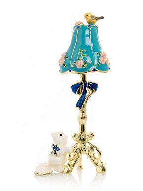 Lampe sur pied dorée avec chat et oiseau