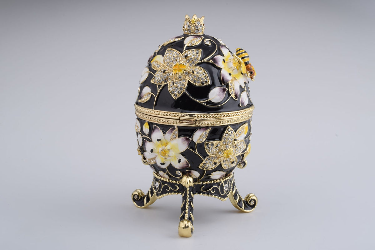 Oeuf de Fabergé noir décoré d'abeilles et de fleurs