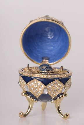 Oeuf Fabergé bleu avec pendentif œuf à l'intérieur