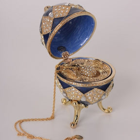 Oeuf Fabergé bleu avec pendentif œuf à l'intérieur