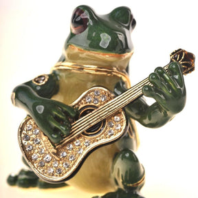 Grenouille jouant de la guitare