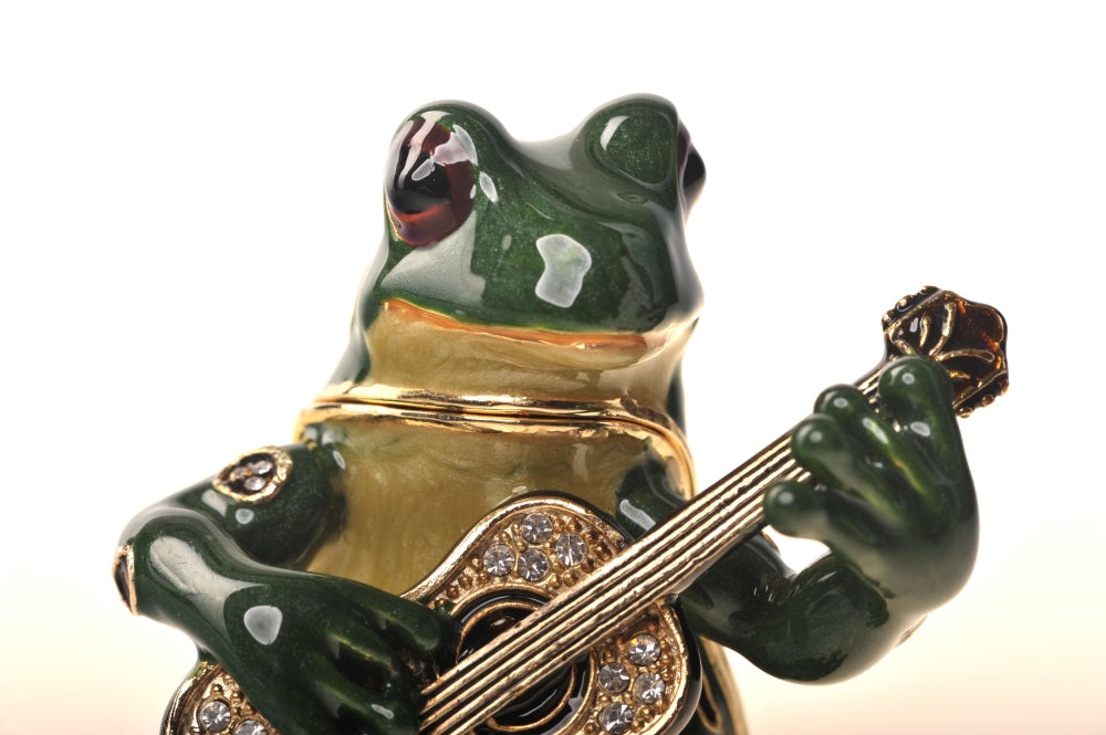 Grenouille jouant de la guitare