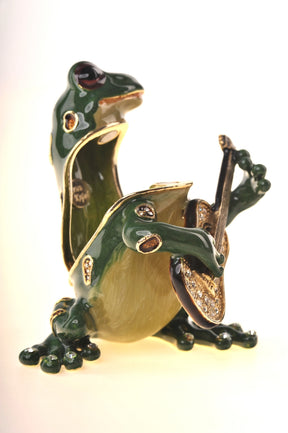 Grenouille jouant de la guitare