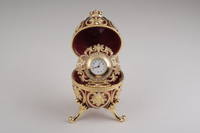 Keren Kopal Gold & Red Faberge Egg with Clock  124.00