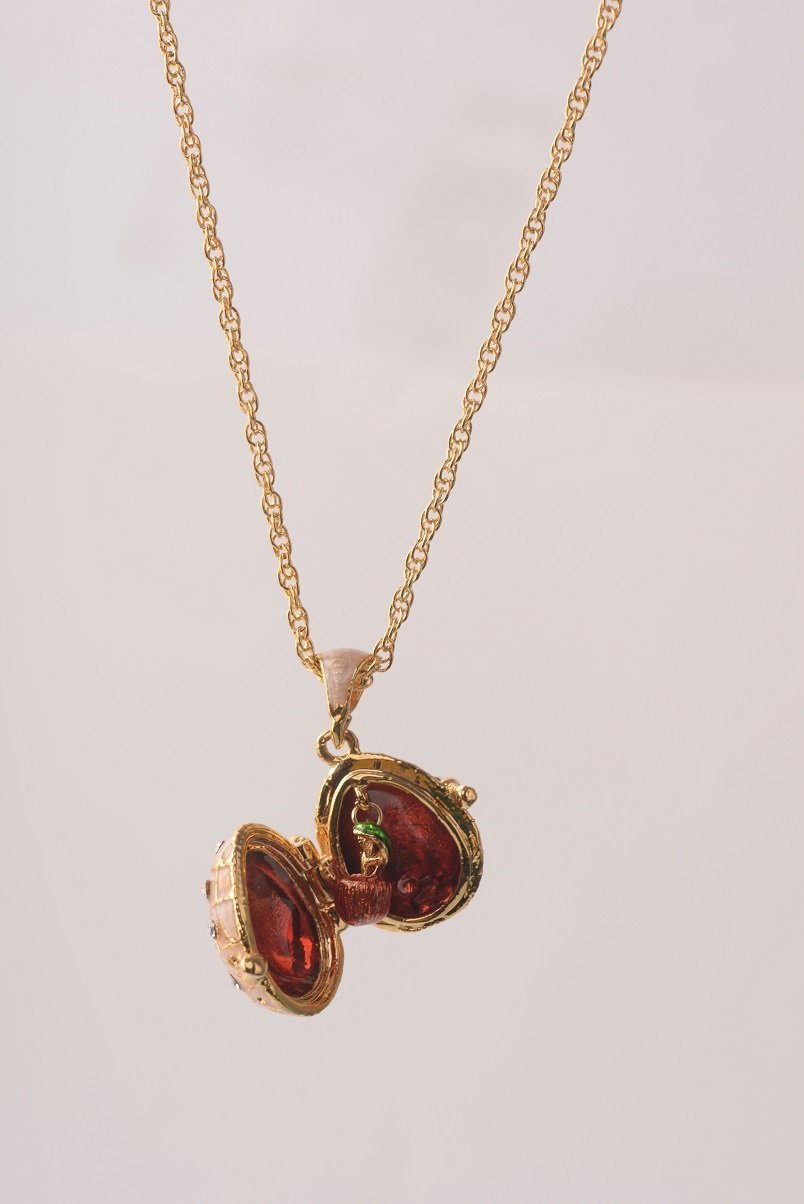 Keren Kopal Pink Pendant Necklace with an Apple Inside  37.00