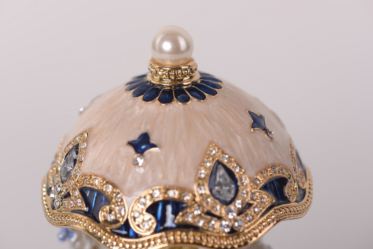 Keren Kopal White Faberge Egg with Horse Carousel  114.00